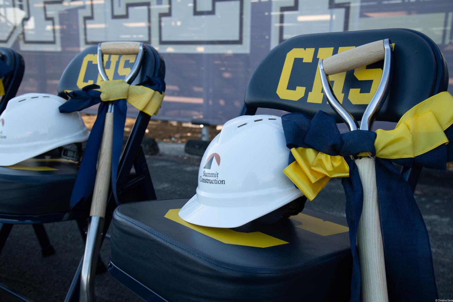 Hard Hats on Chairs at Groundbreaking
