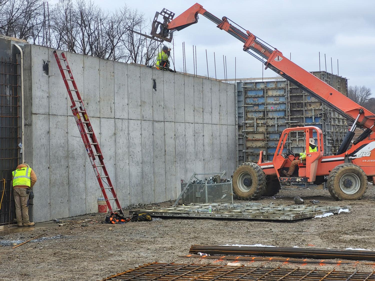 Retaining wall being erected at Lancaster High School site 