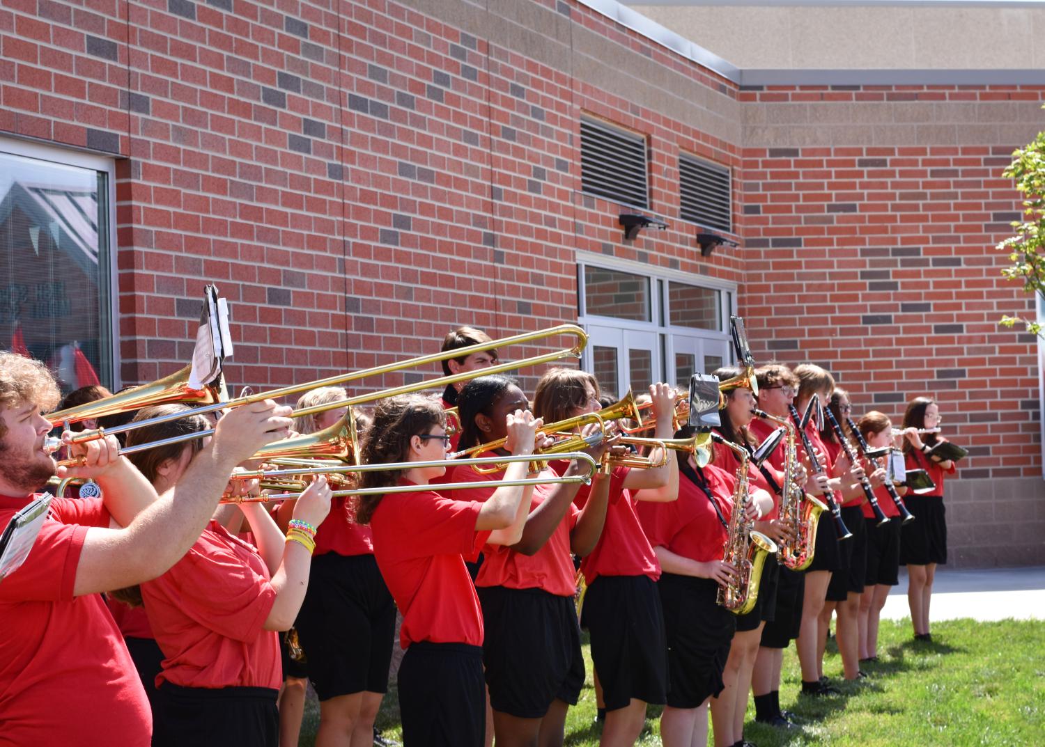 Logan Elm marching band playing music during ribbon cutting 