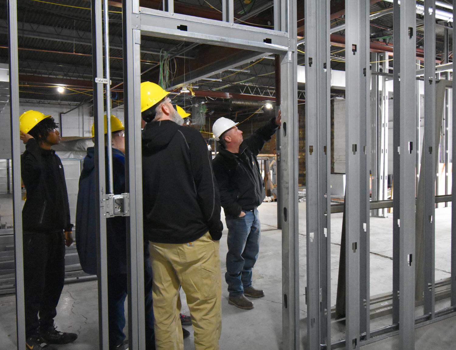 Summit Superintendent leading a site tour for students 