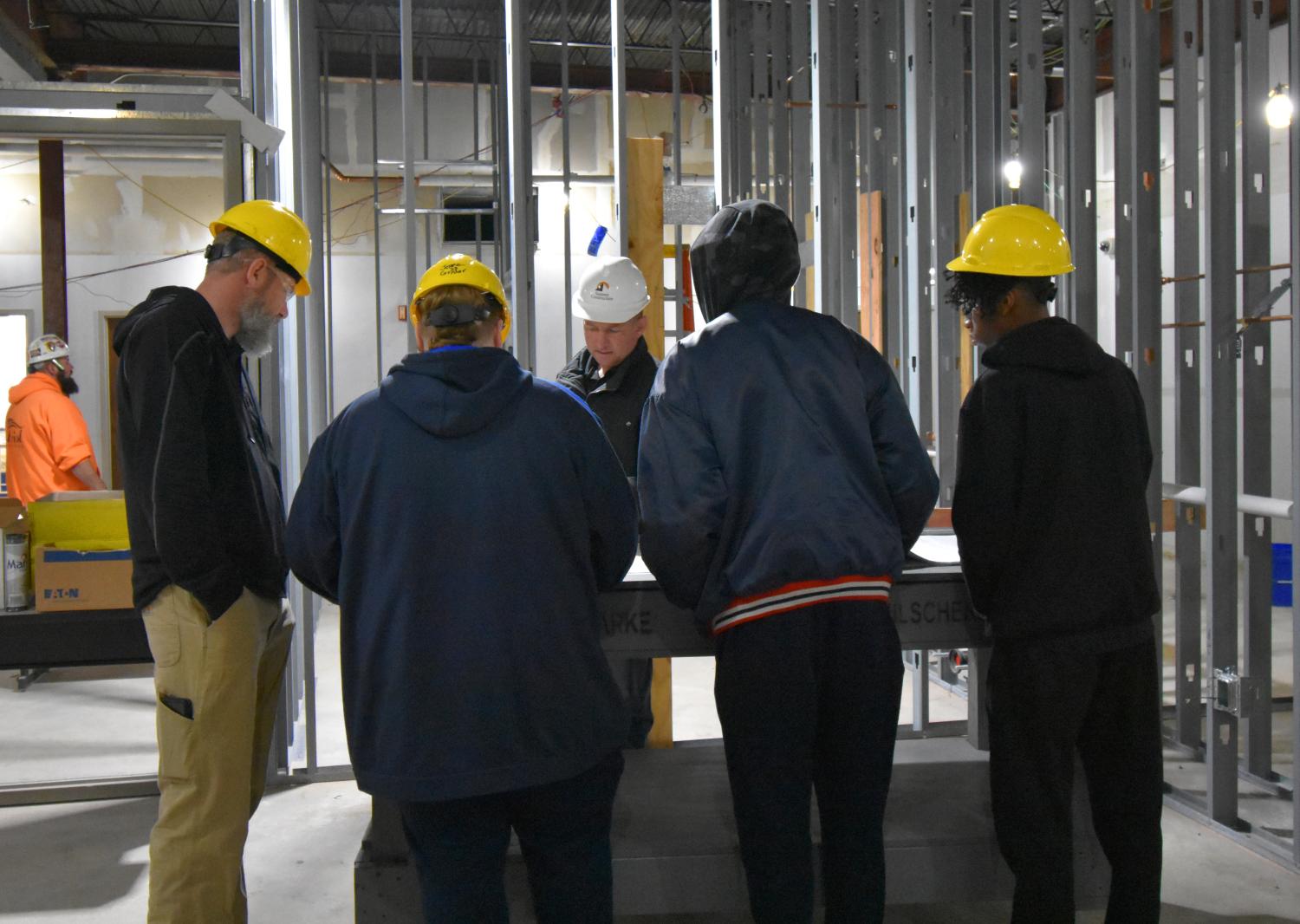 Summit Superintendent leading a site tour for students 