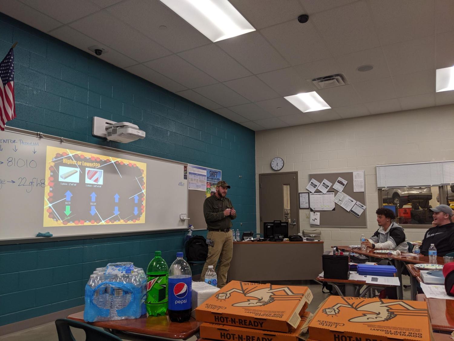 Pete teaching in a high school classroom 