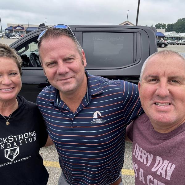 Andy Rogers with Kristi and Terry Johnson of the BrockStrong Foundation